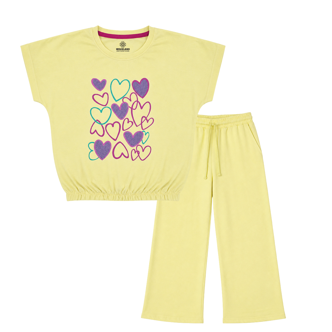 Yellow pajama set with colorful heart designs on a white background