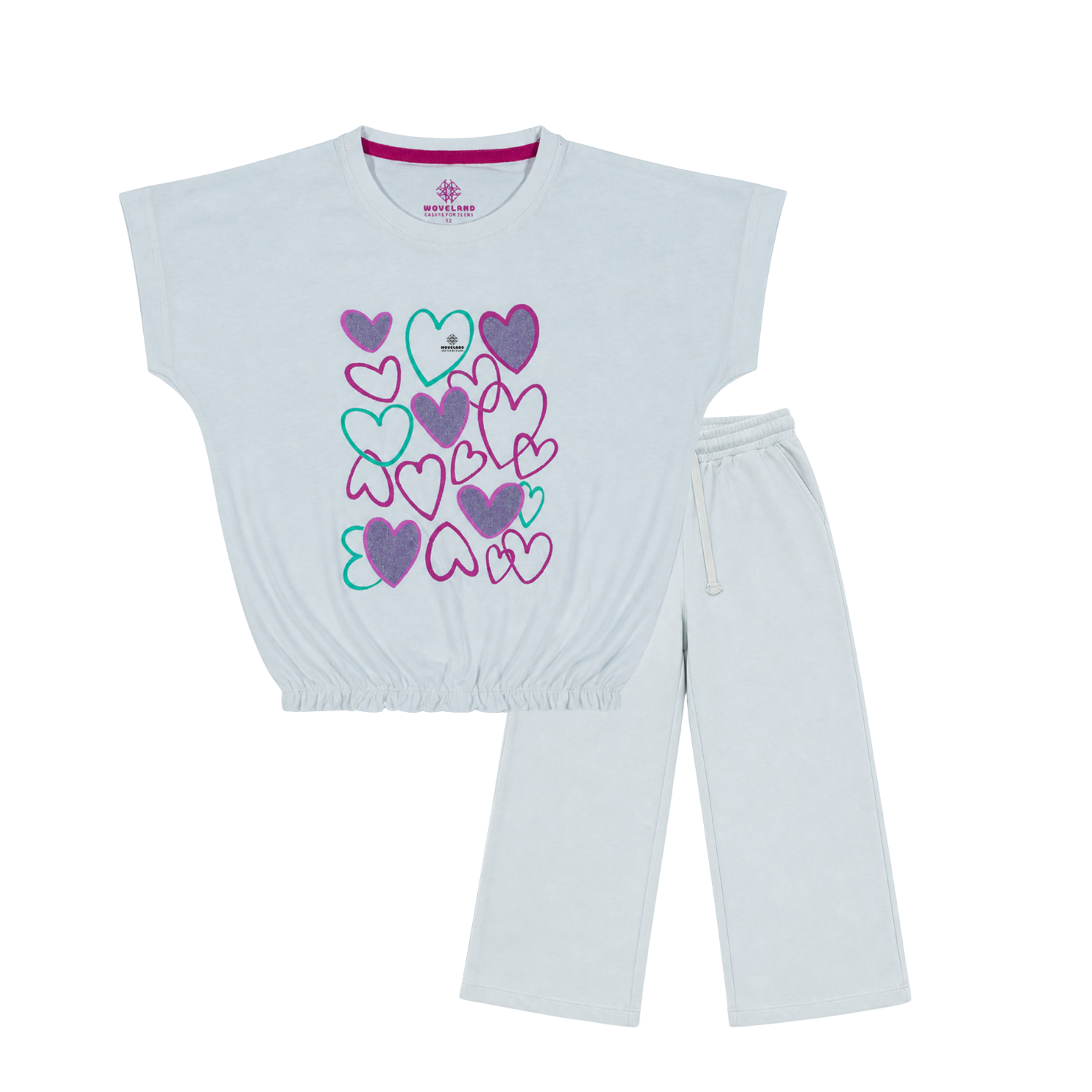 White t-shirt with colorful heart design and white pants on a white background