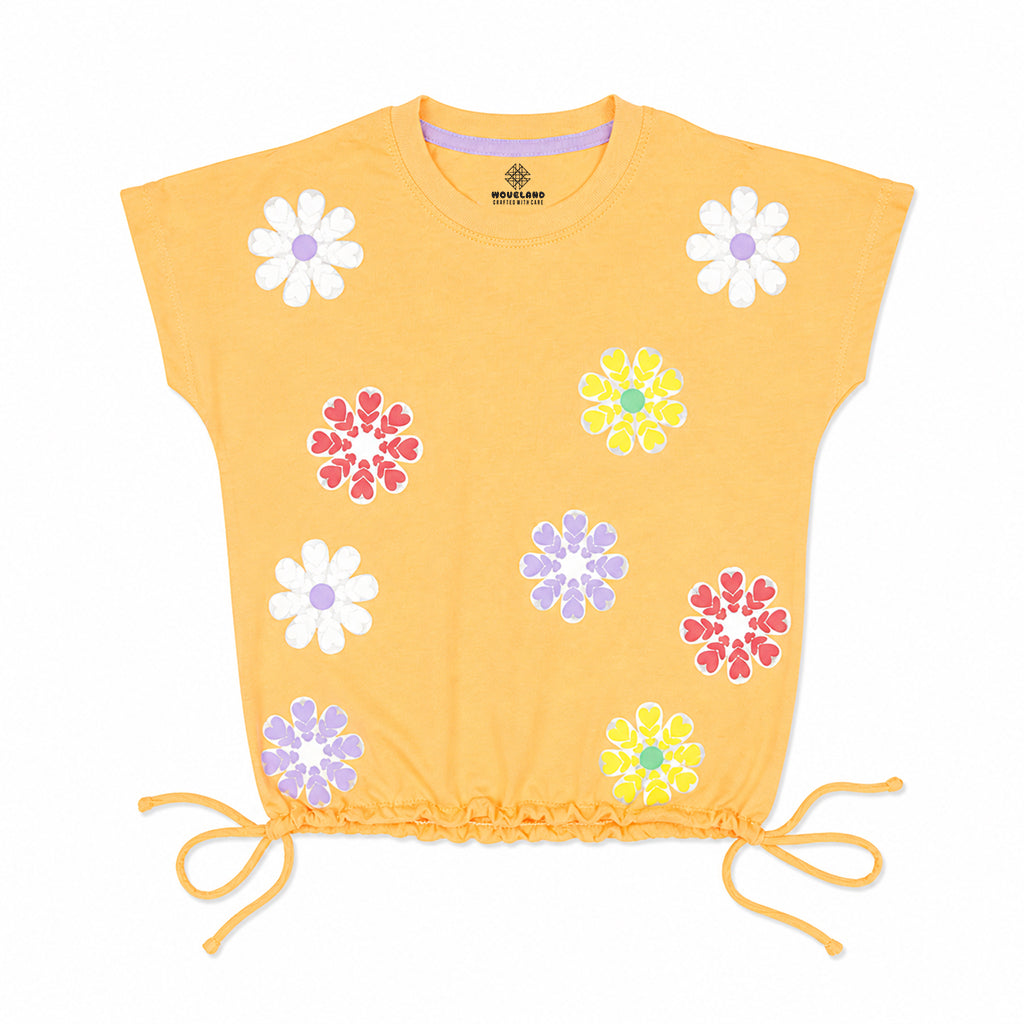 Woveland kids clothing: Flat lay front view of the children's orange floral garden crop tee with side ties.